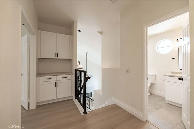 a view of a storage & utility room with closet area