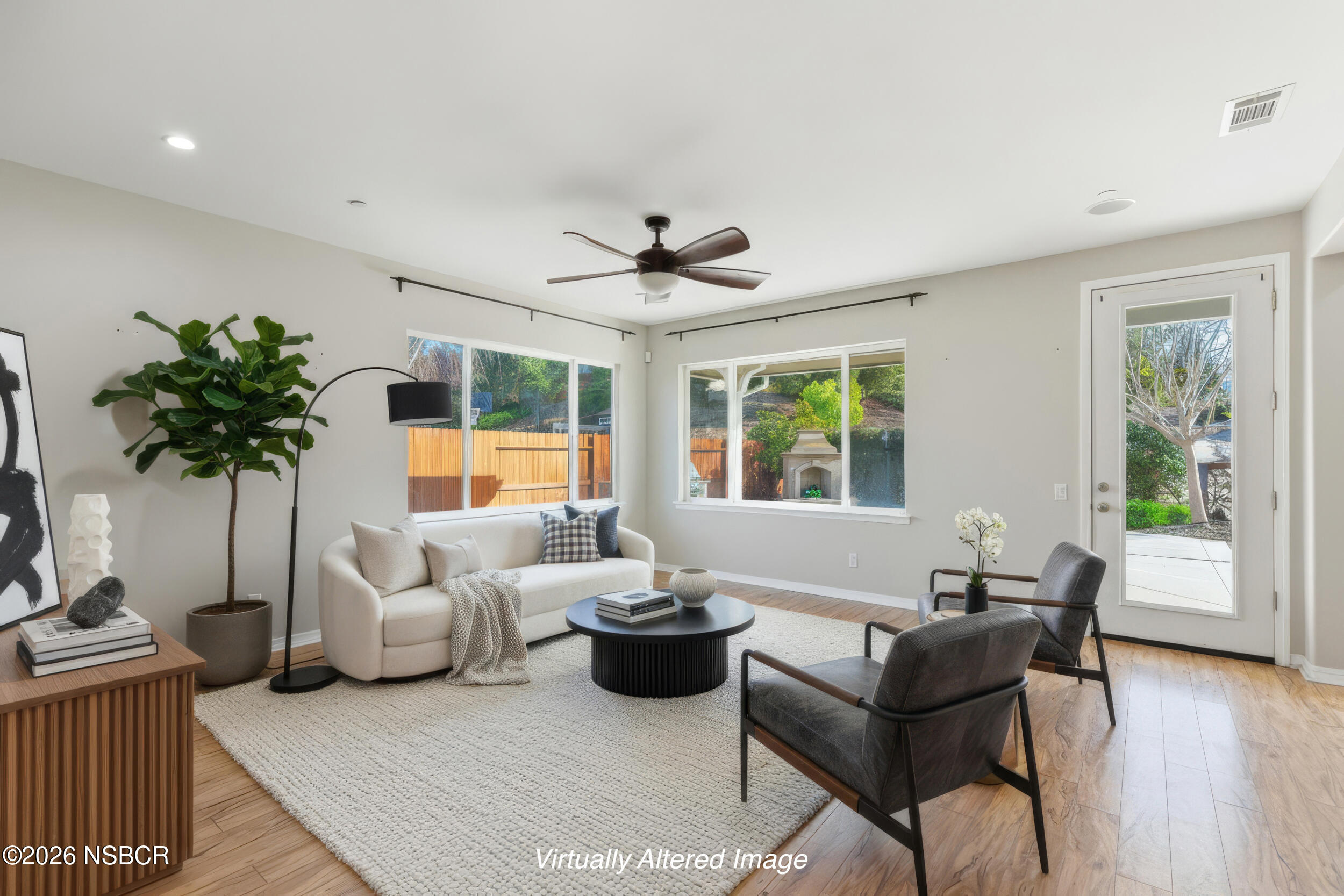 5632 Menemsha Lane Santa Maria, CA 93455 - Photo 16 of 66 a living room with furniture and a large window