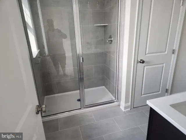 a bathroom with a bath tub