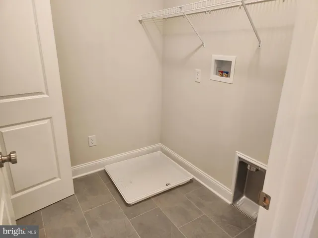 an empty room with a door