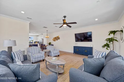 a bathroom with a granite countertop toilet and a sink