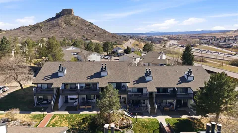 an aerial view of house with yard