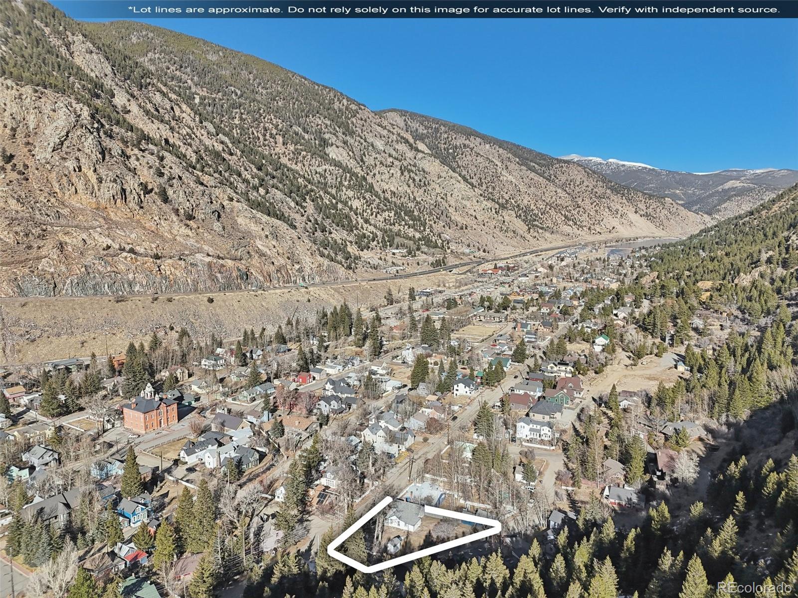 800 Main Street Georgetown, CO 80444 - Photo 20 of 21 a view of a dry yard with wooden fence