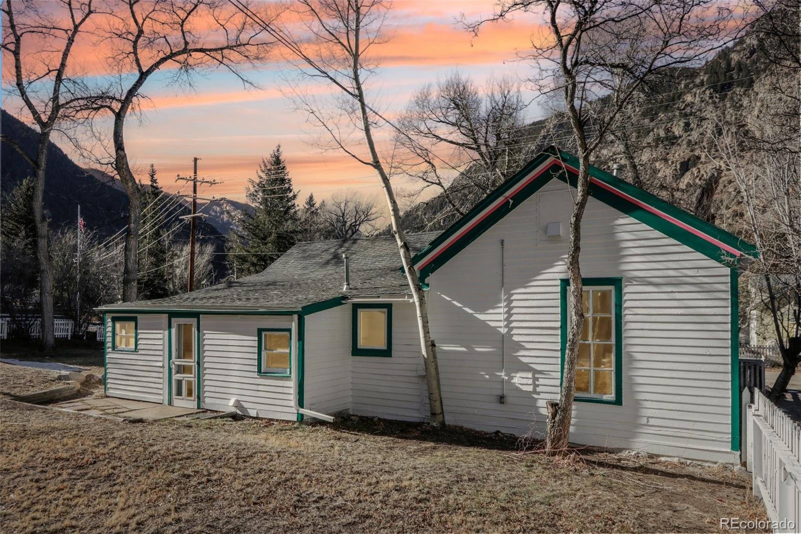 800 Main Street Georgetown, CO 80444 - Photo 2 of 21 a view of a house with a yard