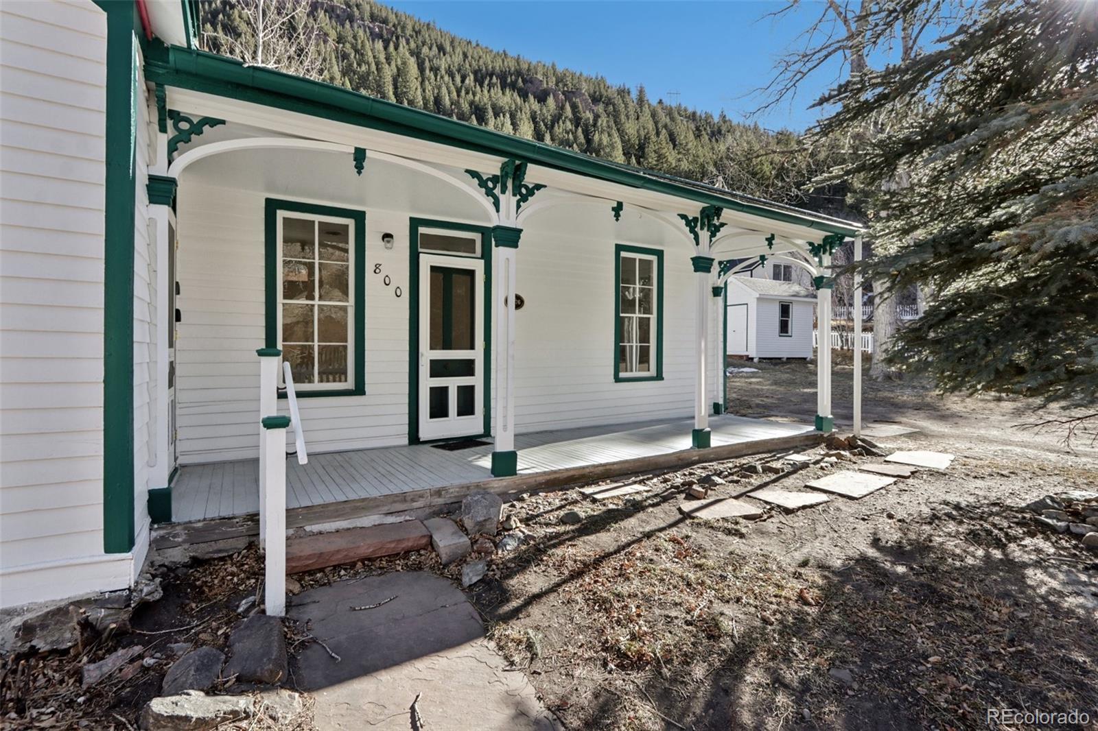 800 Main Street Georgetown, CO 80444 - Photo 5 of 21 a view of a house with a tree