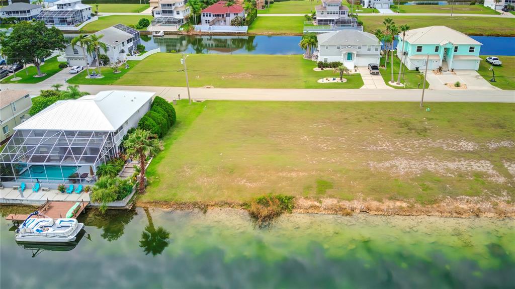 3487 Croaker Drive Hernando Beach, FL 34607 - Photo 5 of 23 an aerial view of residential houses with outdoor space