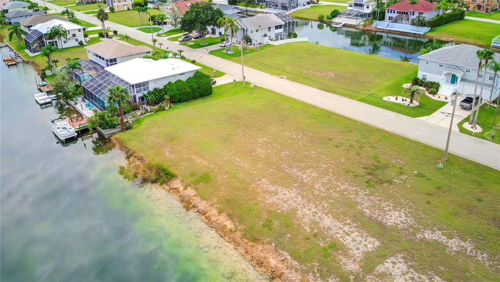 3487 Croaker Drive Hernando Beach, FL 34607 - Photo 6 of 23 an aerial view of residential houses with outdoor space
