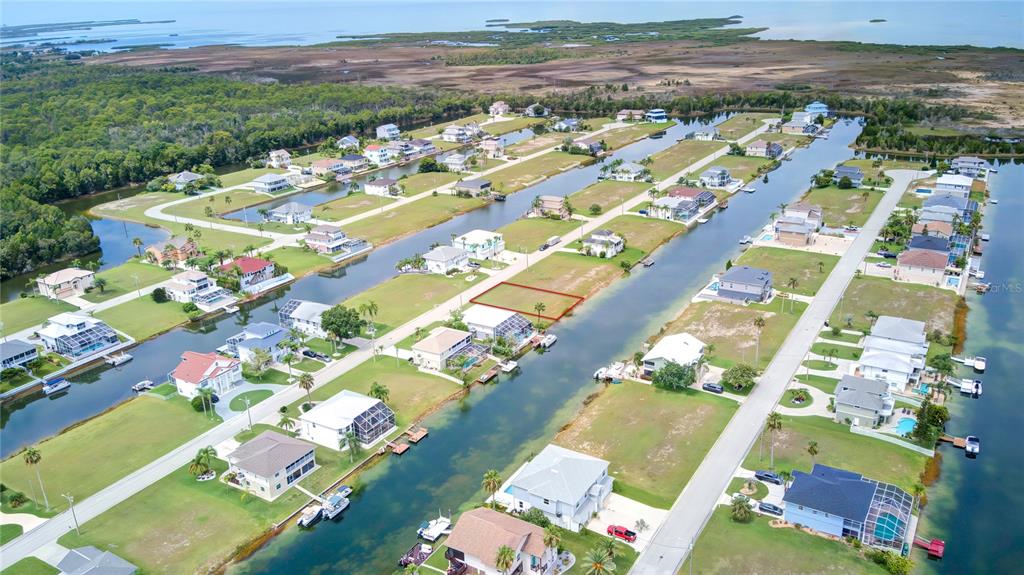 3487 Croaker Drive Hernando Beach, FL 34607 - Photo 10 of 23 an aerial view of residential houses with outdoor space