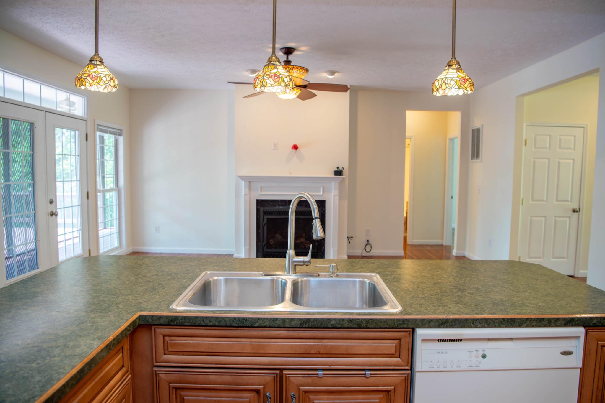 792 Forest Glen Road Moorefield, WV 26836 - Photo 26 of 146 Bright and inviting kitchen/living room space.