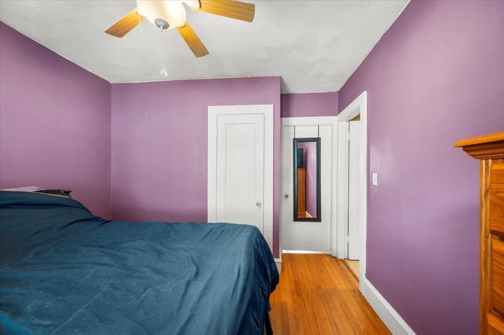 7 Turner Street Springfield, MA 01108 - Photo 31 of 41 a bedroom with a bed and a mirror