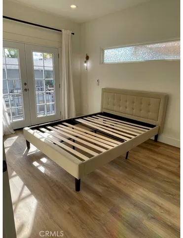 a bathroom with a double vanity sink toilet and shower