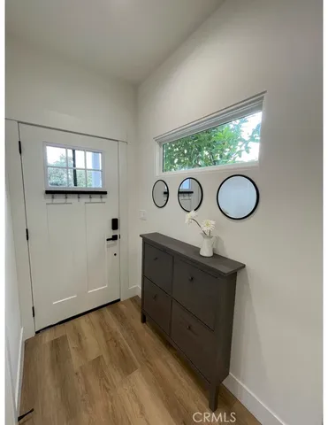 a view of kitchen island with wooden floor