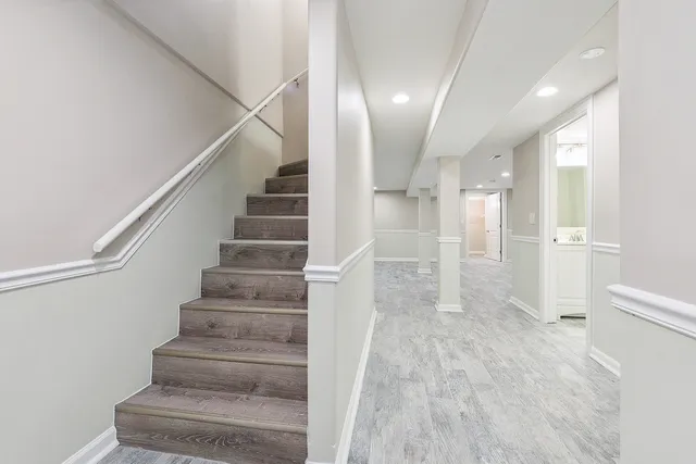 a view of entryway with wooden floor