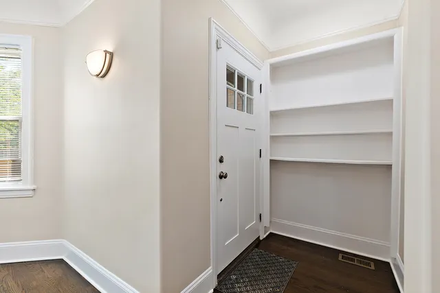 a view of a room with rack on the wall