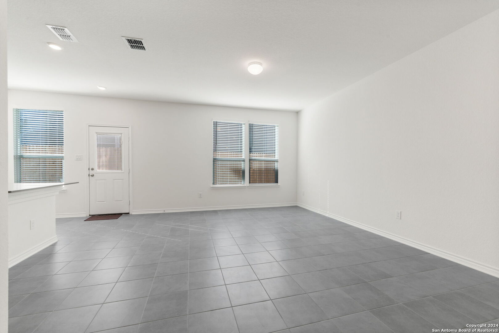 14839 Vance Jackson Road, Unit 910 San Antonio, TX 78249 - Photo 13 of 29 a view of an empty room with a window