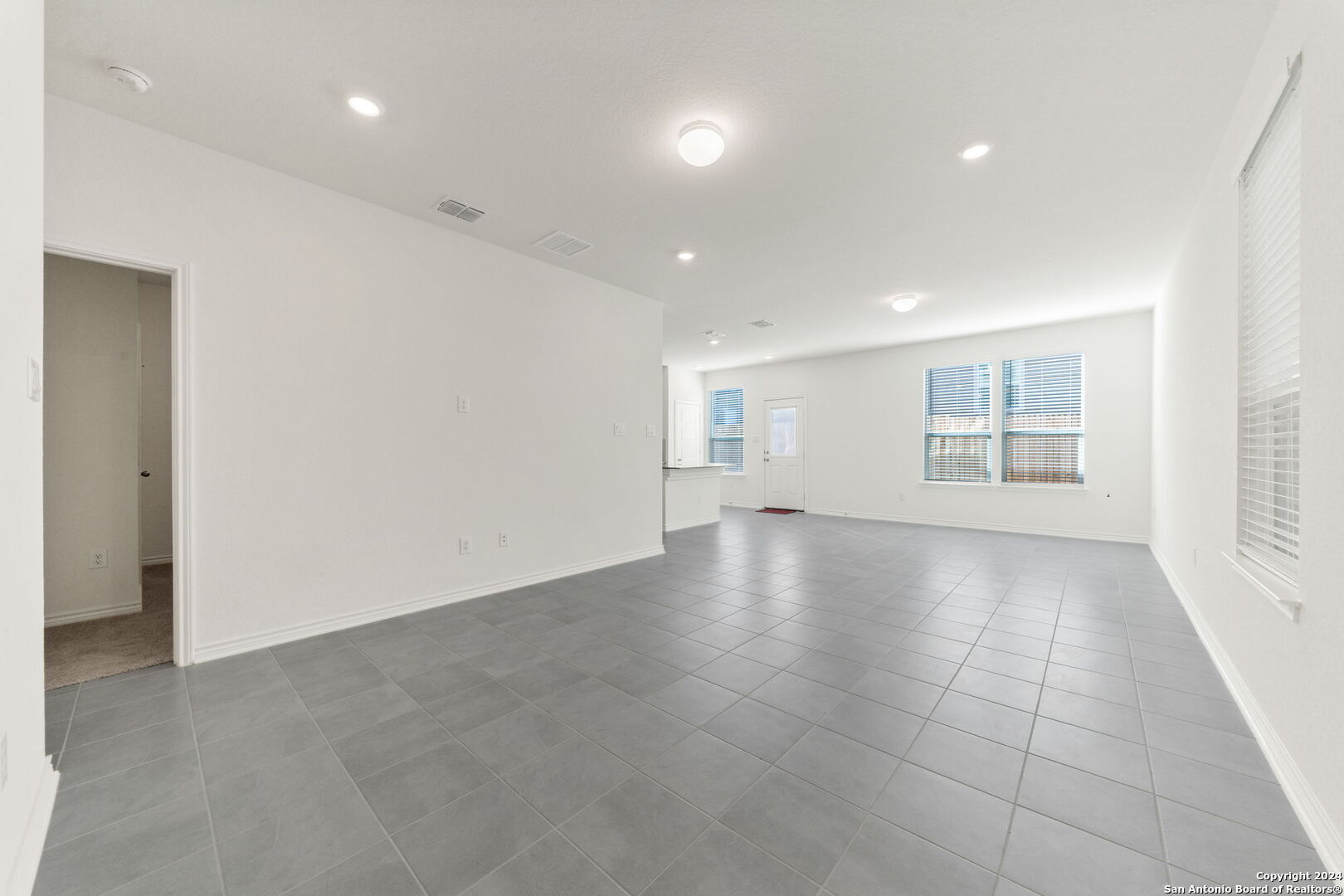 14839 Vance Jackson Road, Unit 910 San Antonio, TX 78249 - Photo 5 of 29 a view of an empty room with a window