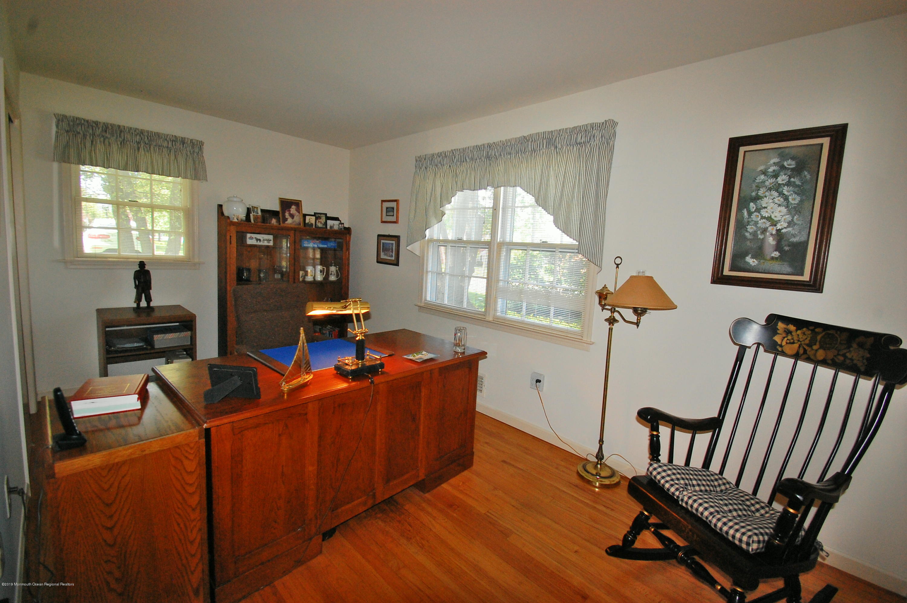 108 Aberdeen Road Aberdeen, NJ 07747 - Photo 17 of 24 a living room with furniture a window and a flat screen tv