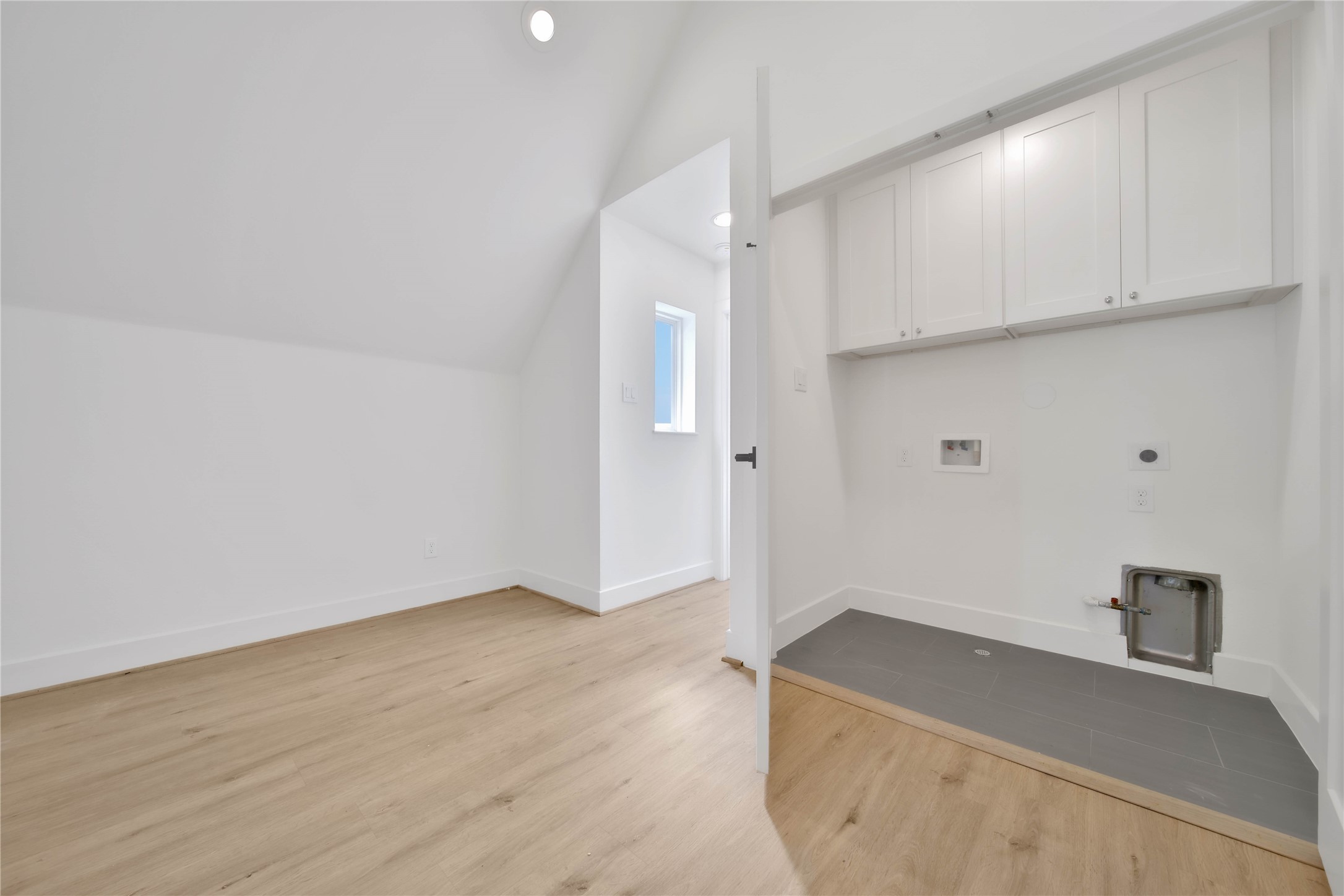 7407 Rusk Street, Unit A Houston, TX 77011 - Photo 17 of 24 Large utility room with plenty of storage.
