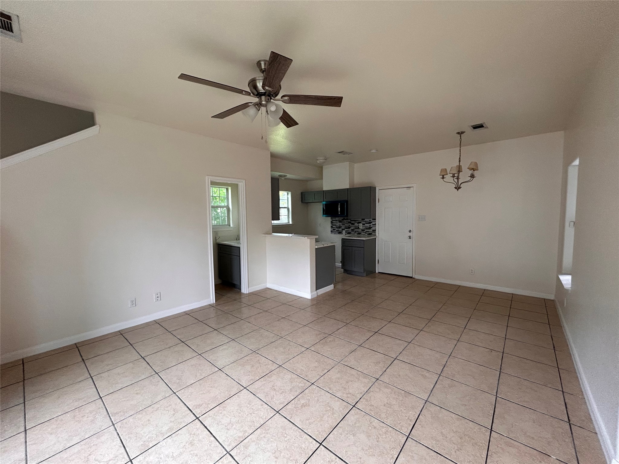 6841 Larkstone Street, Unit B Houston, TX 77028 - Photo 11 of 11 a view of a kitchen with a sink and dishwasher kitchen appliances
