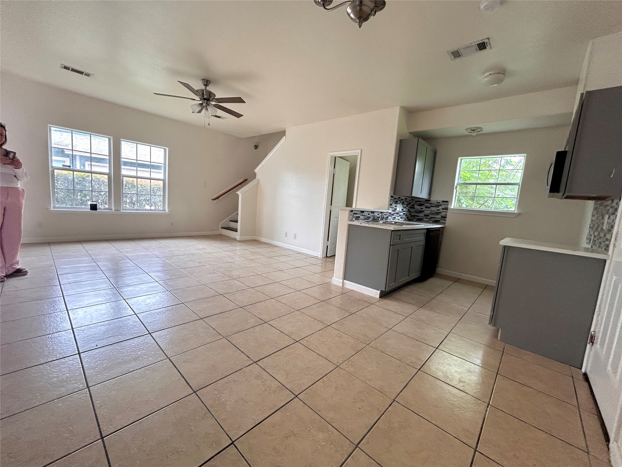 6841 Larkstone Street, Unit B Houston, TX 77028 - Photo 9 of 11 a view of a kitchen with furniture and windows