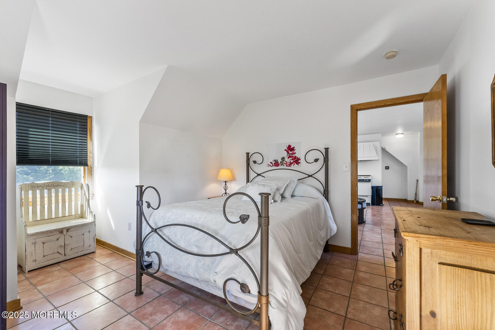 18 Schoolhouse Road Cream Ridge, NJ 08514 - Photo 94 of 136 a bedroom with a bed and wooden floor