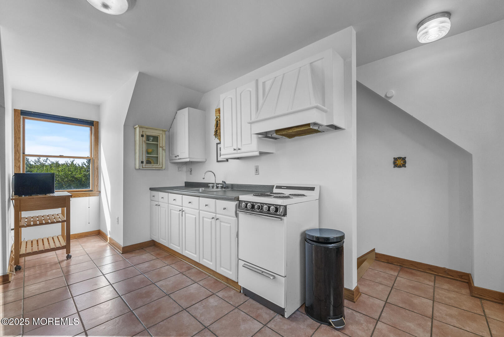 18 Schoolhouse Road Cream Ridge, NJ 08514 - Photo 95 of 136 a kitchen with stainless steel appliances granite countertop a stove a sink and a refrigerator