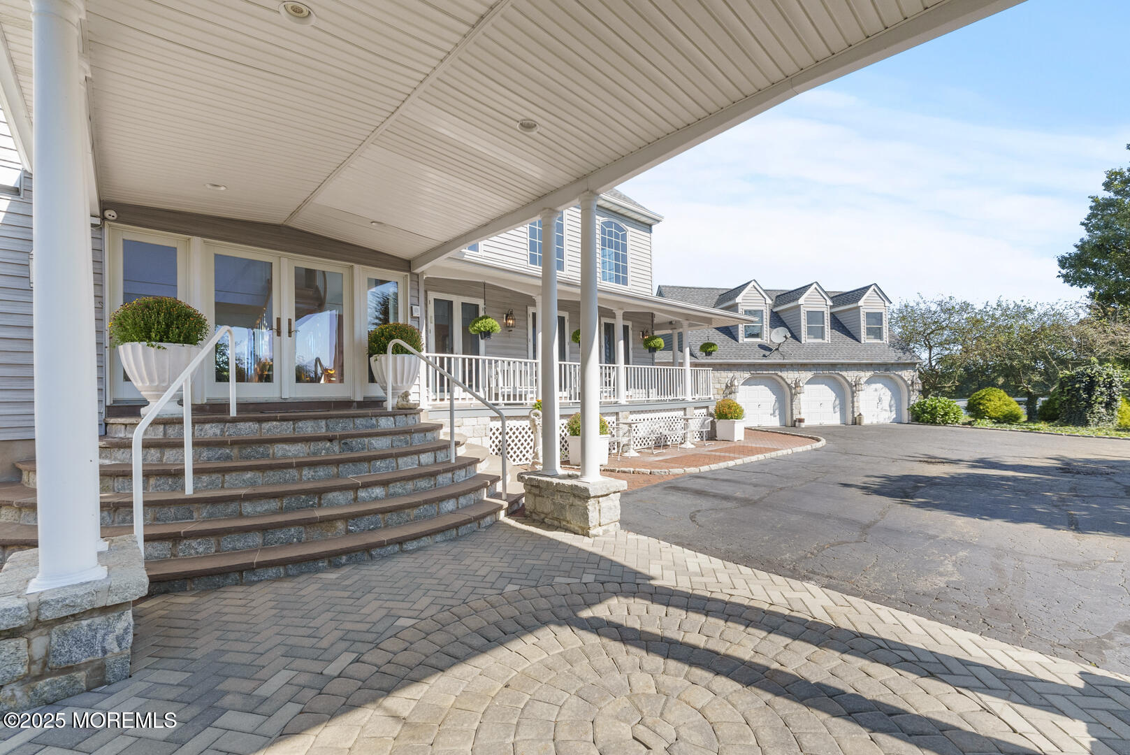 18 Schoolhouse Road Cream Ridge, NJ 08514 - Photo 10 of 136 a front view of a house with a garden