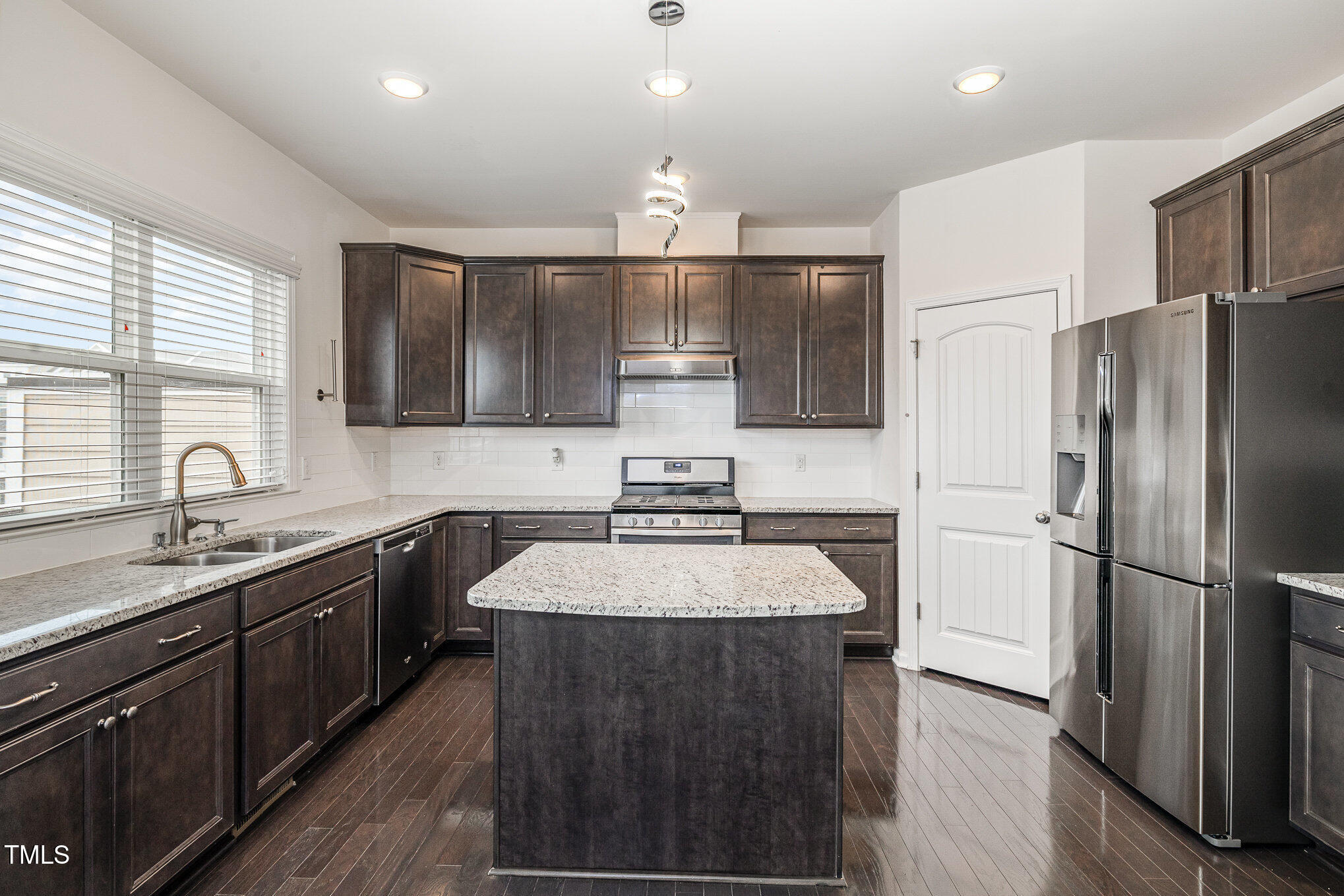 7002 Reedybrook Crossing Apex, NC 27523 - Photo 6 of 27 Kitchen with Island