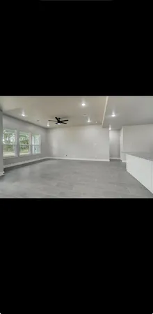 a view of kitchen island with stainless steel appliances