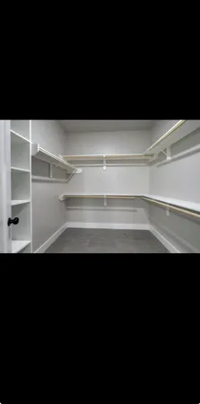 a view of kitchen island with sink