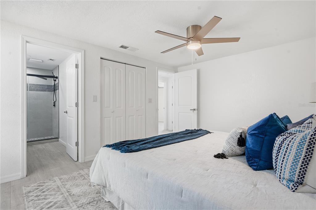 613 Highview Circle North Brandon, FL 33510 - Photo 22 of 37 a bedroom with a bed and closet