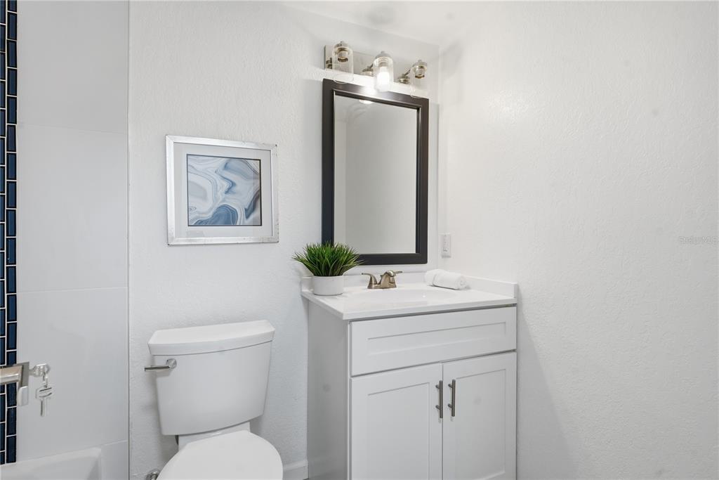 613 Highview Circle North Brandon, FL 33510 - Photo 26 of 37 a bathroom with a toilet sink and mirror