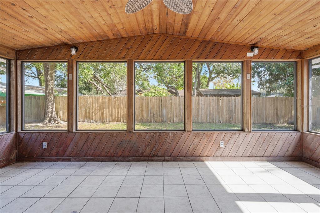 613 Highview Circle North Brandon, FL 33510 - Photo 28 of 37 an empty room with windows and outdoor space