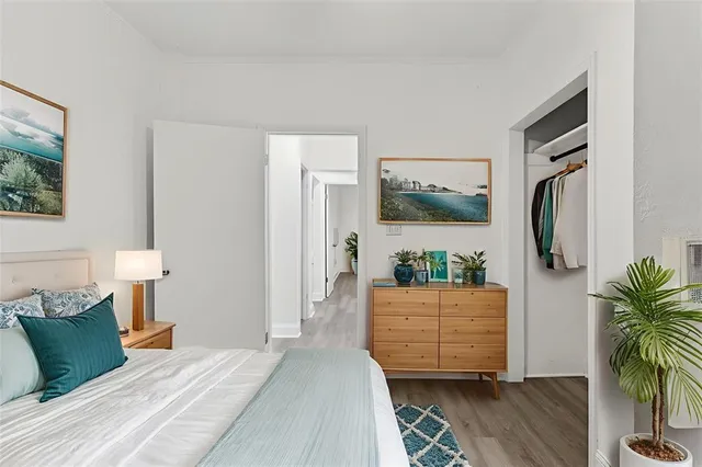 an aerial view of residential houses with city view