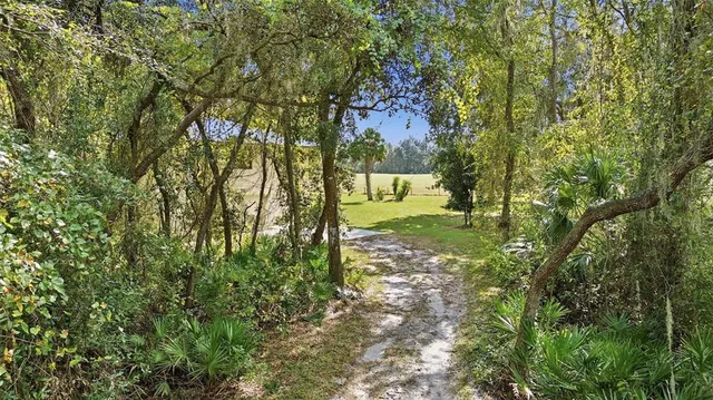 a view of a large body of water with a building in the background