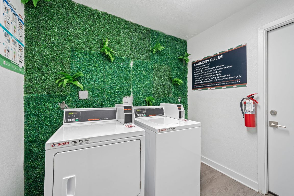 2410 Longview Street, Unit D101 Austin, TX 78705 - Photo 14 of 20 a utility room with dryer and washer