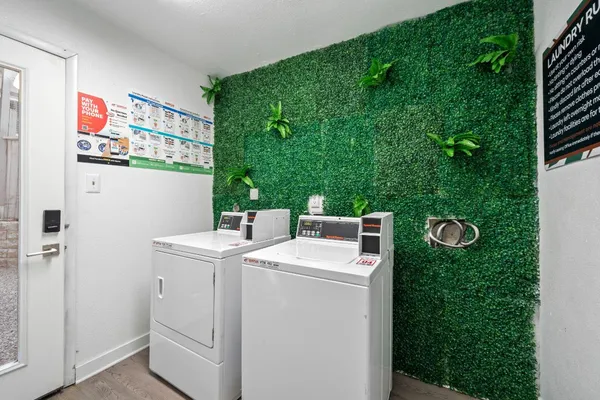 a utility room with dryer and washer