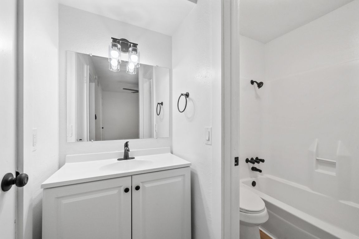 2410 Longview Street, Unit D101 Austin, TX 78705 - Photo 10 of 20 a bathroom with a sink toilet tub and shower