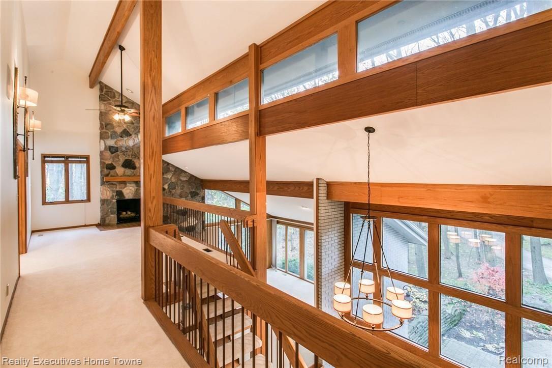 1130 Burnham Road Bloomfield Hills, MI 48304 - Photo 27 of 56 Cozy upstairs gathering area with gas fireplace.