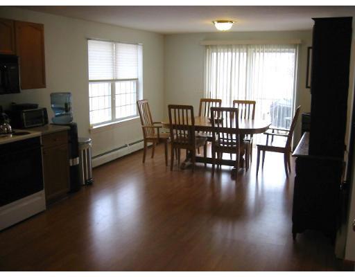 11 Round Road Lunenburg, MA 01462 - Photo 3 of 17 a view of a dining room with furniture window and wooden floor