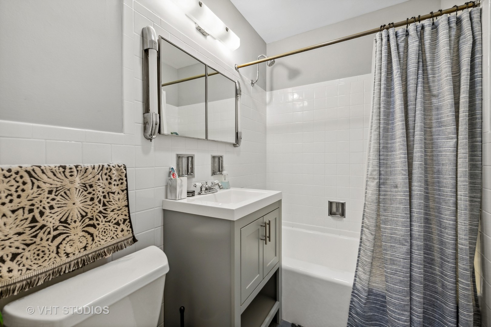 7221 Division Street, Unit 1 River Forest, IL 60305 - Photo 11 of 15 a bathroom with a sink toilet and shower