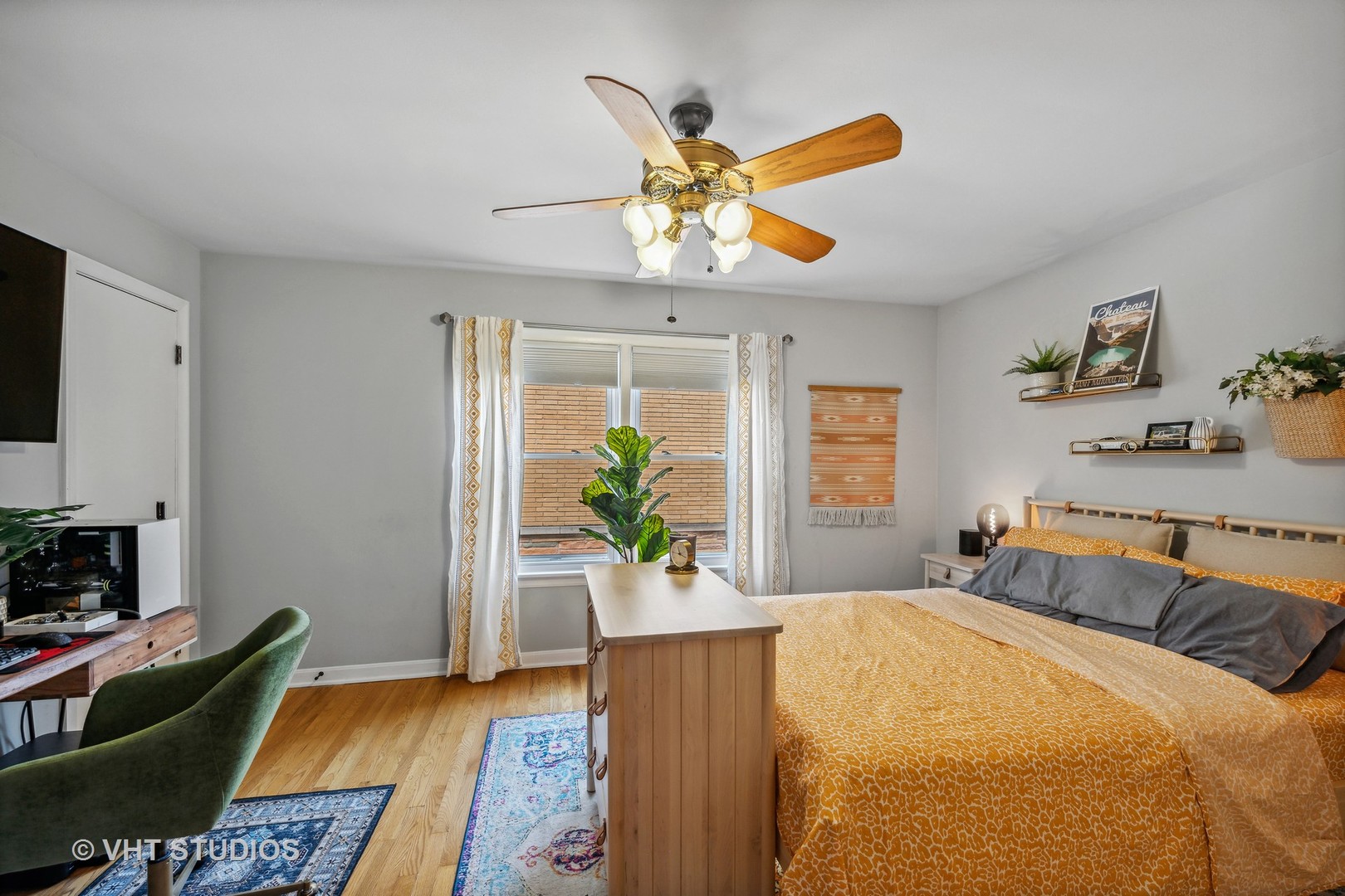 7221 Division Street, Unit 1 River Forest, IL 60305 - Photo 12 of 15 a bedroom with a bed and wooden floor