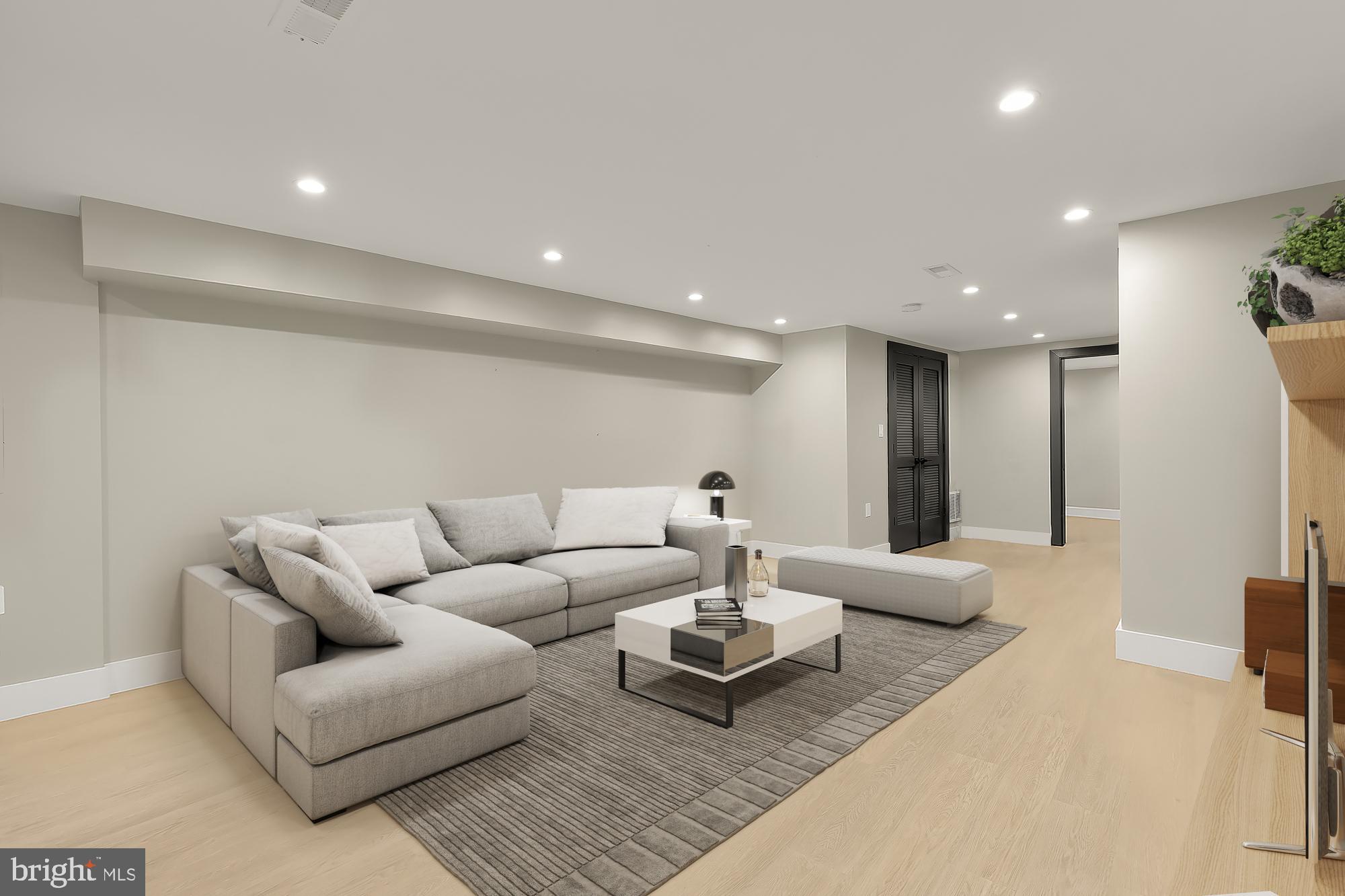 47 T Street Northeast Washington, DC 20002 - Photo 40 of 45 a living room with furniture and a table