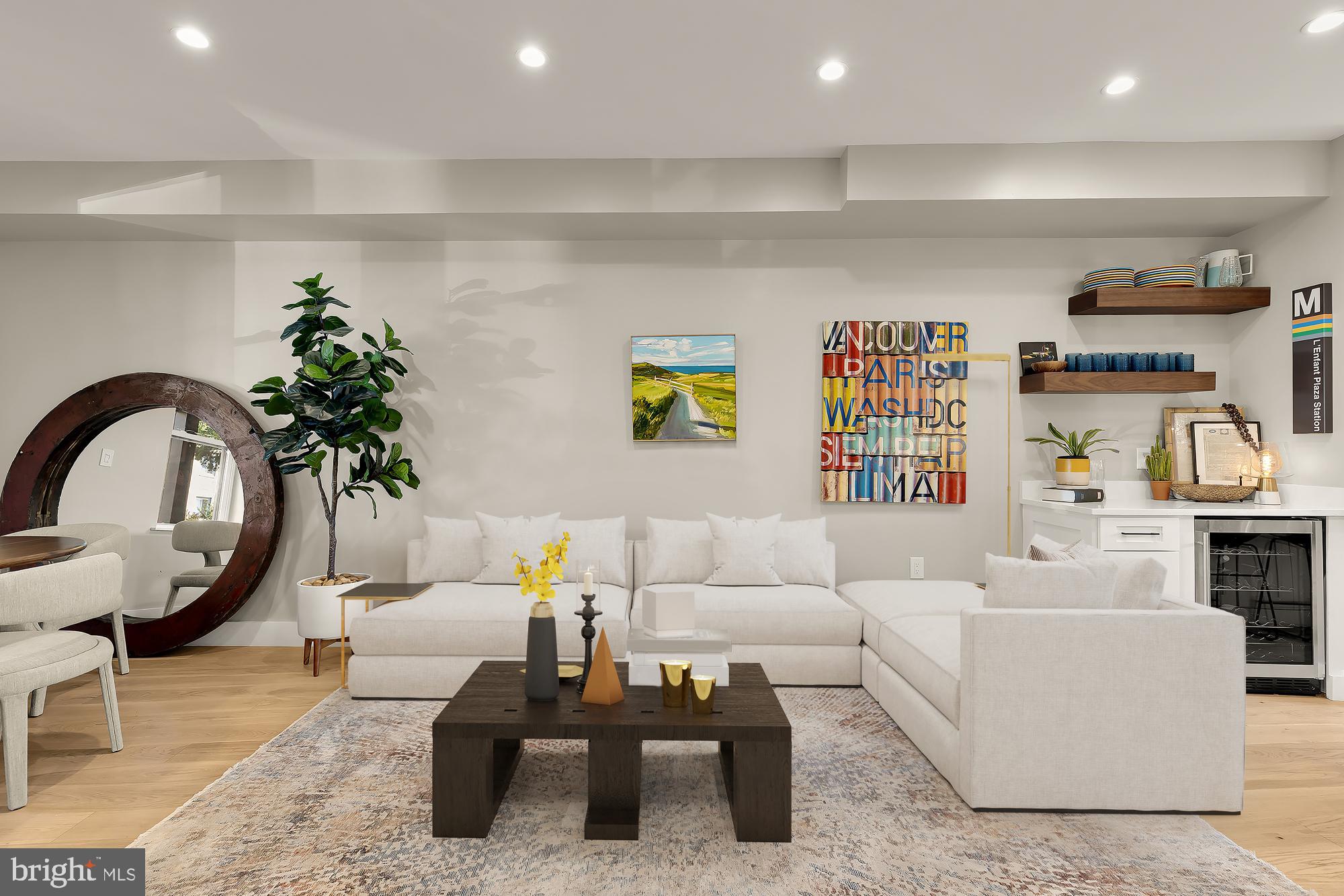47 T Street Northeast Washington, DC 20002 - Photo 9 of 45 a living room with furniture a rug and potted plant
