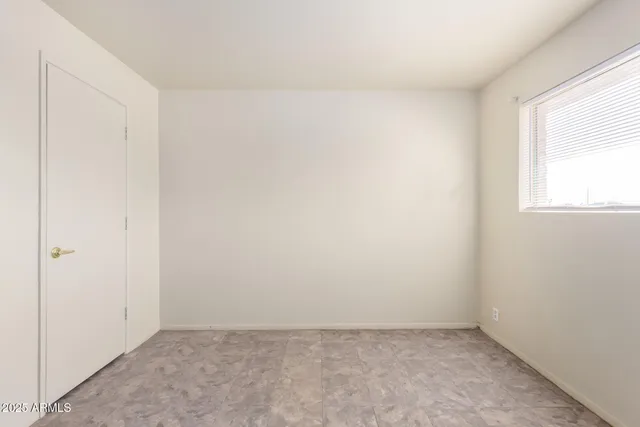 an empty room with a window