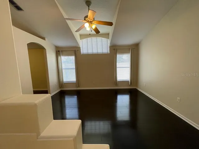 a view of entryway and hall with a window