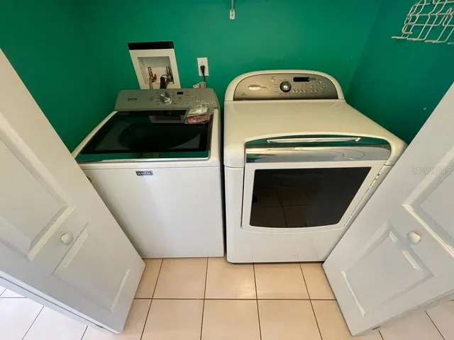 a view of a house with a garden