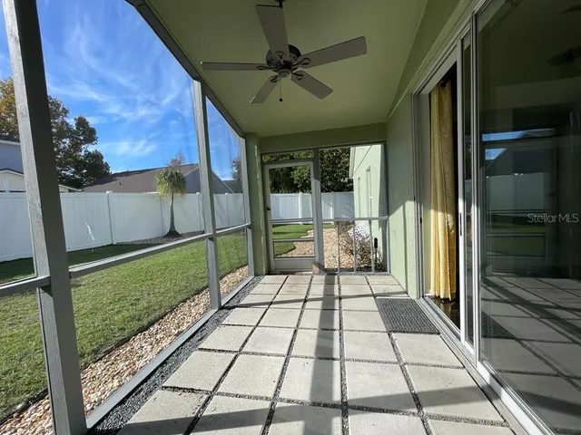 a backyard of a house with lots of green space