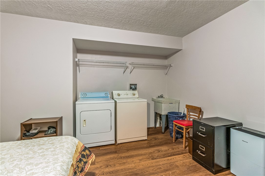 610 West Alex Bell Road Dayton, OH 45459 - Photo 33 of 36 This functional space features modern appliances and durable flooring, ensuring everyday convenience and practicality.