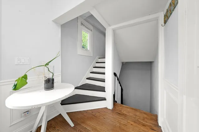 a bed room with a bed and a window